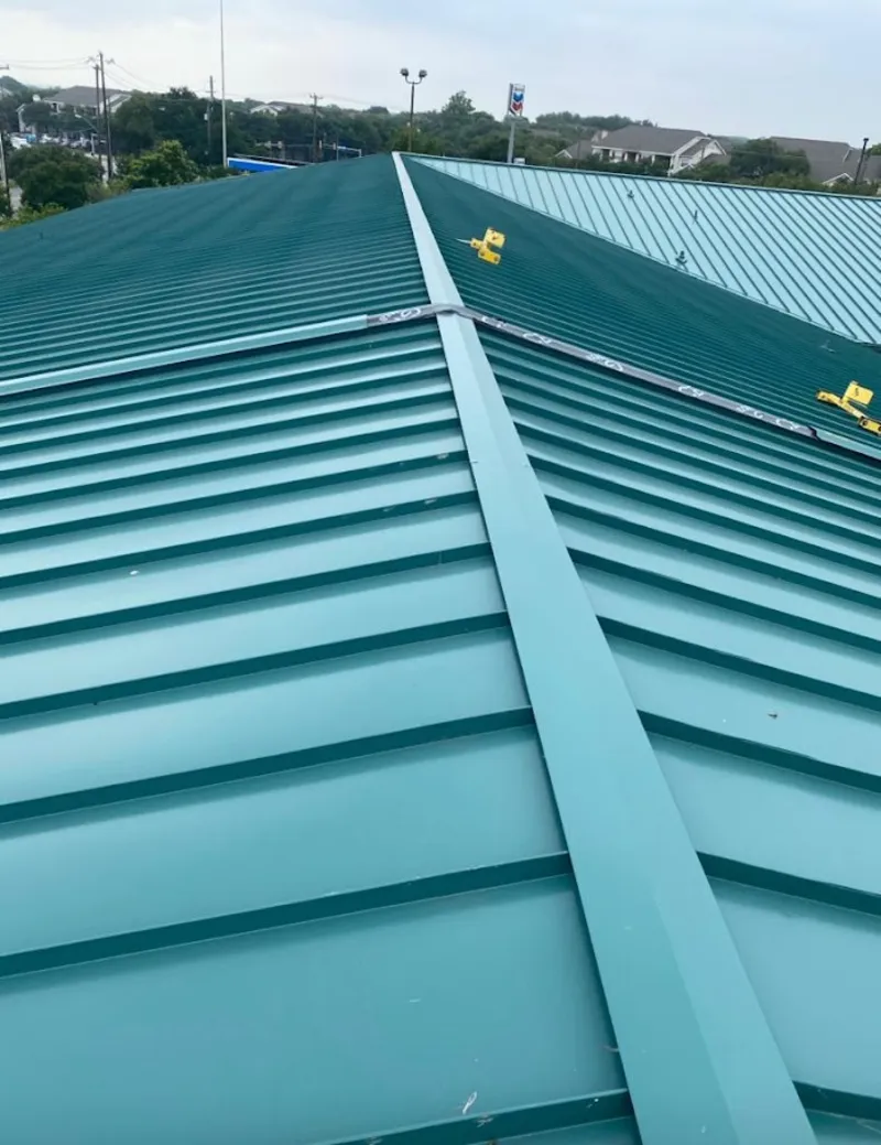 Green commercial metal roof ridge and valley for Metal Roof Repair in Albemarle