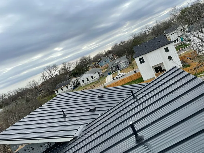 Standing seam metal roof panels with vents for Skylight Repair in Albemarle